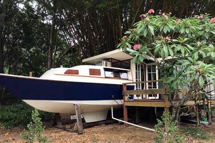 a tiny landlocked boathouse